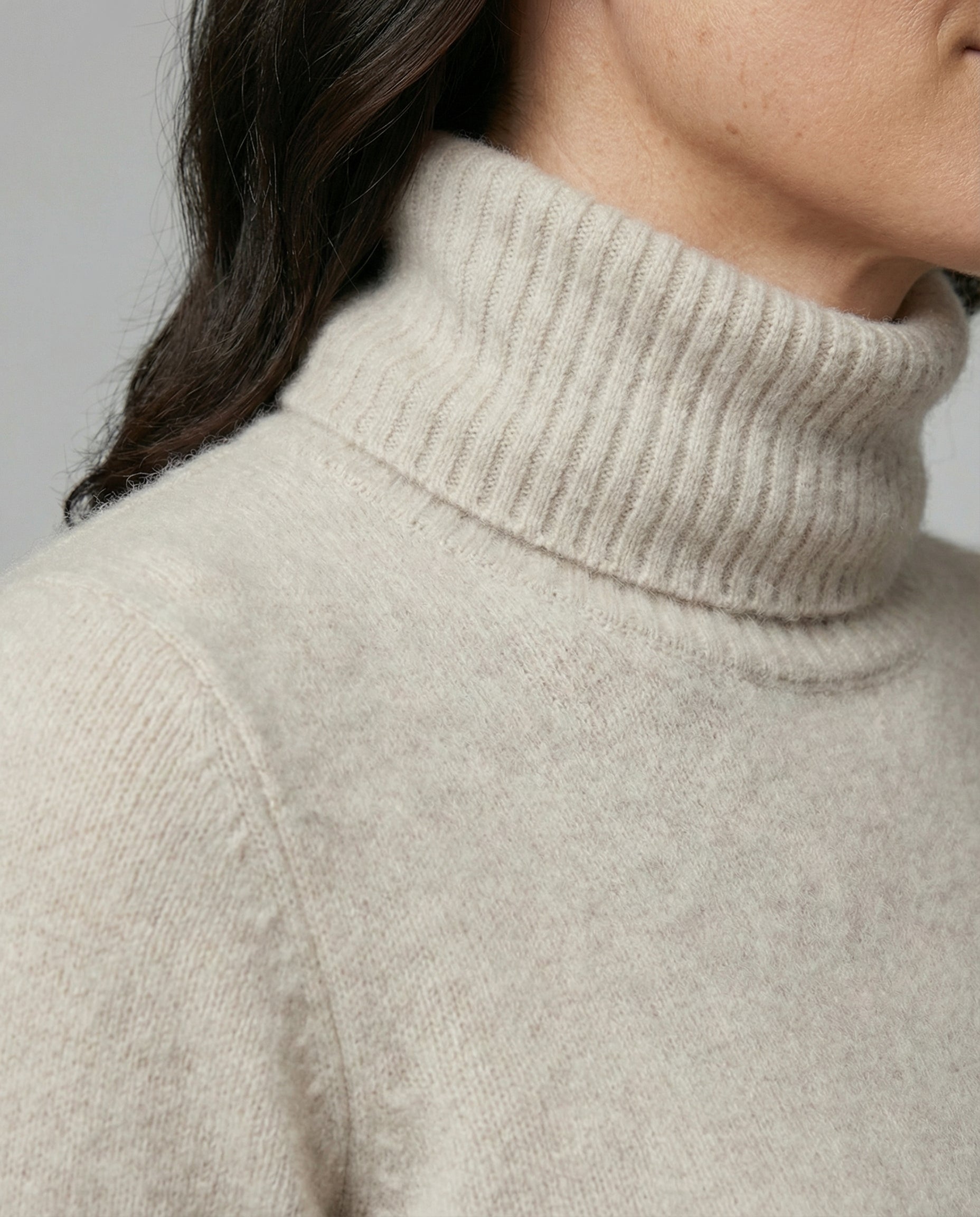 turtleneck sweater with soft knit texture and warm comfort fit