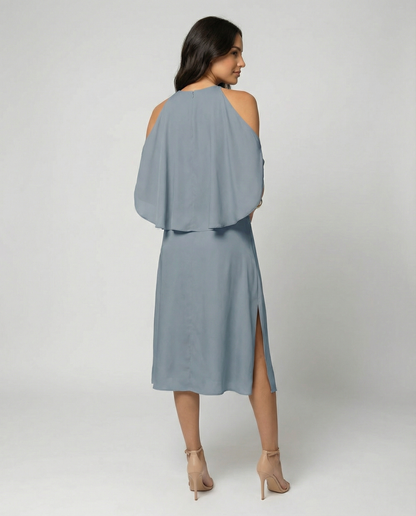 Elegant dress with fashionable shoulder cutouts.