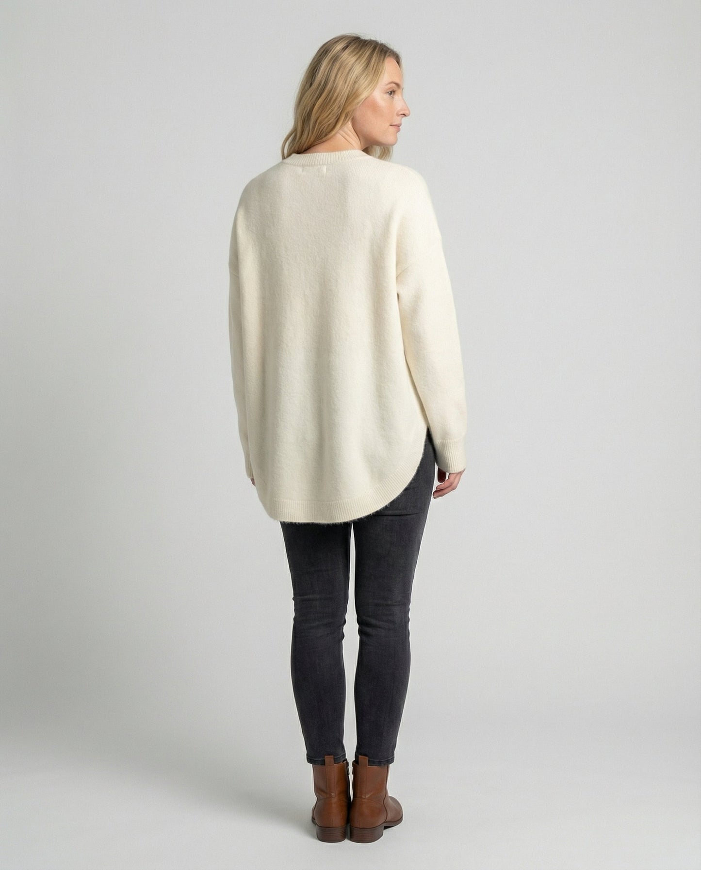 oversized autumn sweater with mid-length cut and relaxed cozy fit
