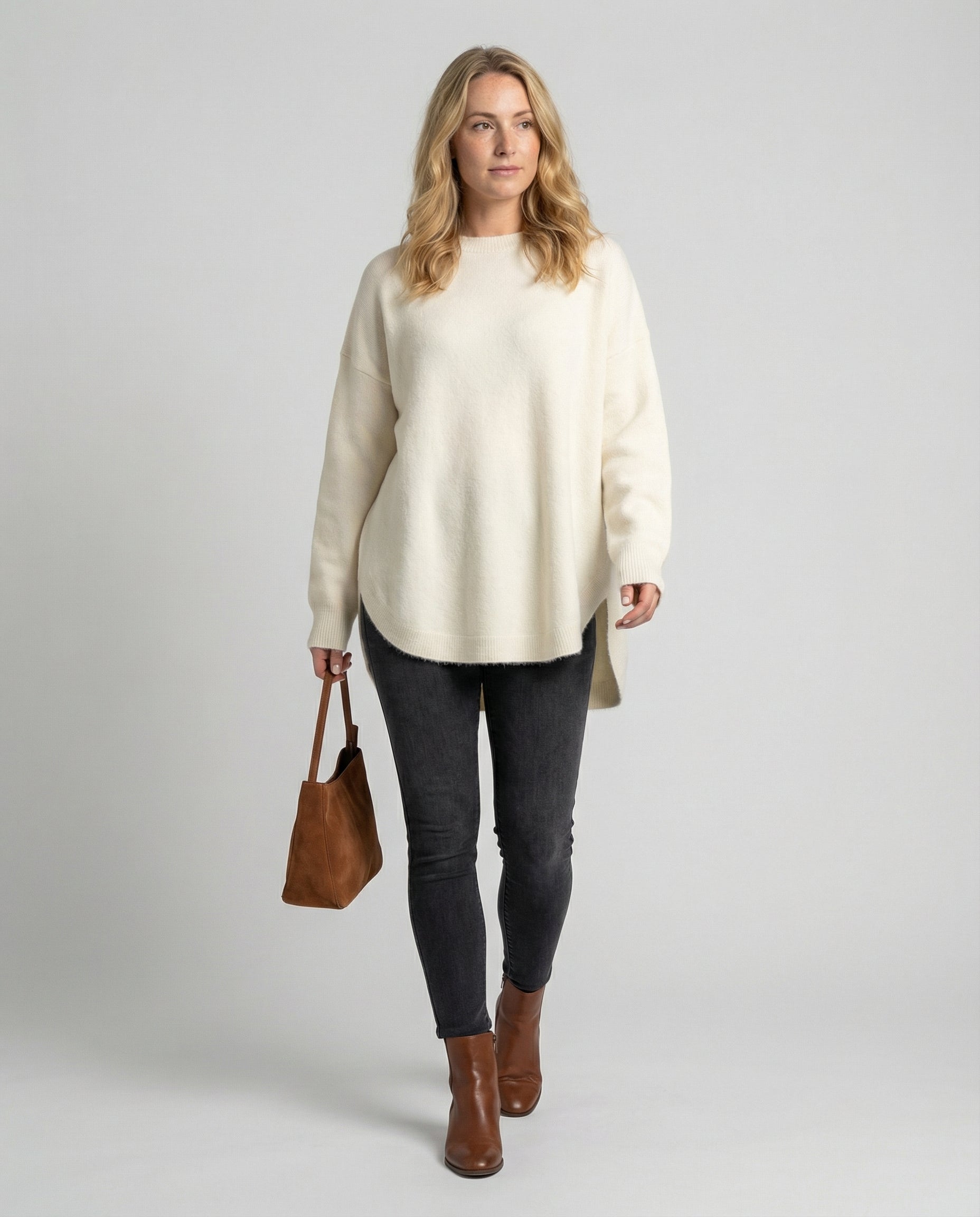 oversized autumn sweater with mid-length cut and relaxed cozy fit