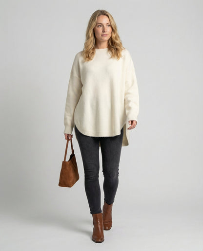 oversized autumn sweater with mid-length cut and relaxed cozy fit