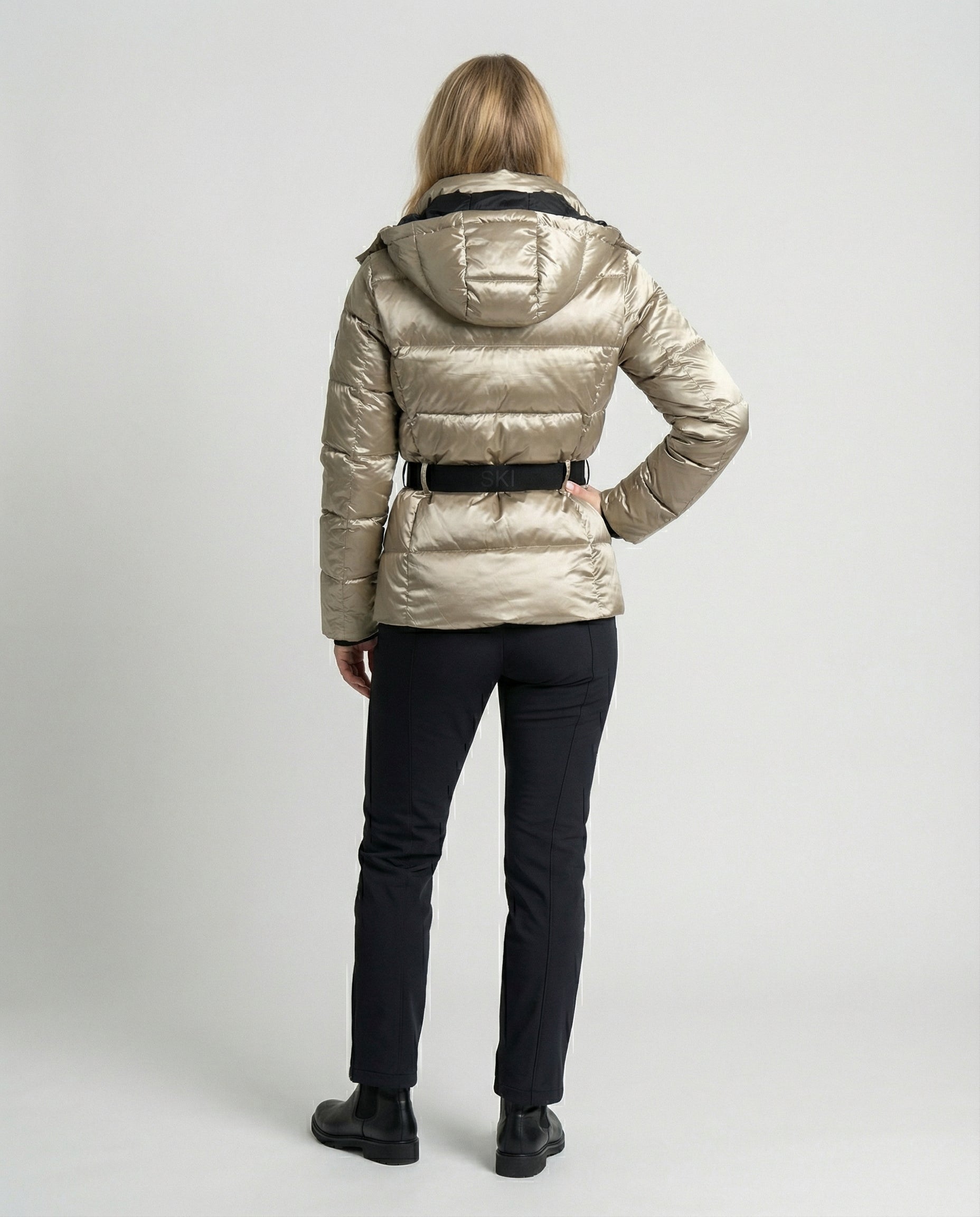 quilted ski jacket with insulated design, hood, and belted waist