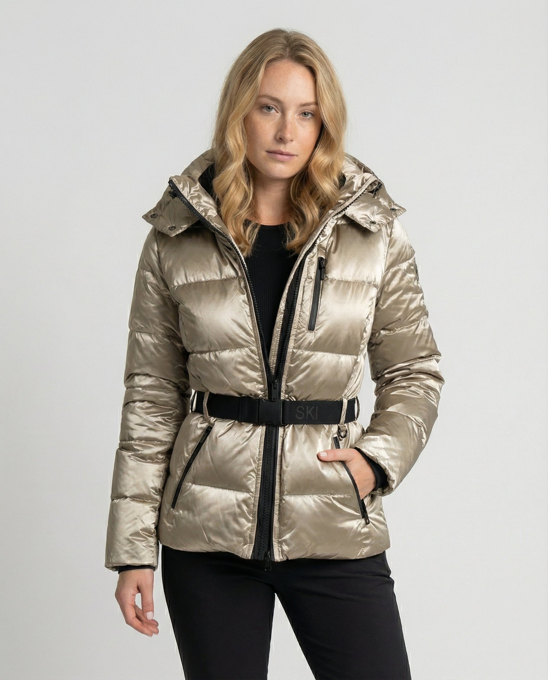 quilted ski jacket with insulated design, hood, and belted waist