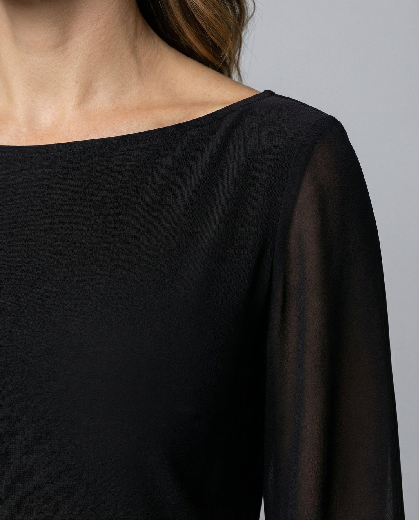 elegant mini dress with structured fit and semi-sheer long sleeves