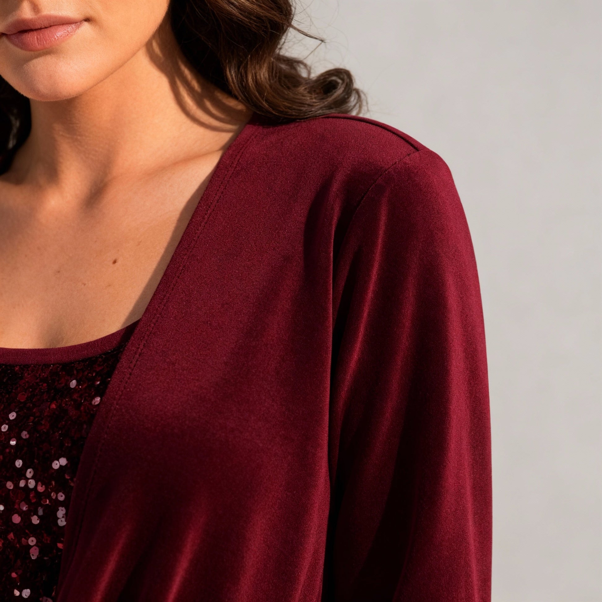 figure-flattering sequin blouse with long sleeves and elegant shaping fit