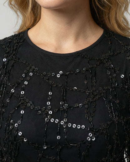 fringe sequin dress with elegant statement silhouette and shimmering finish