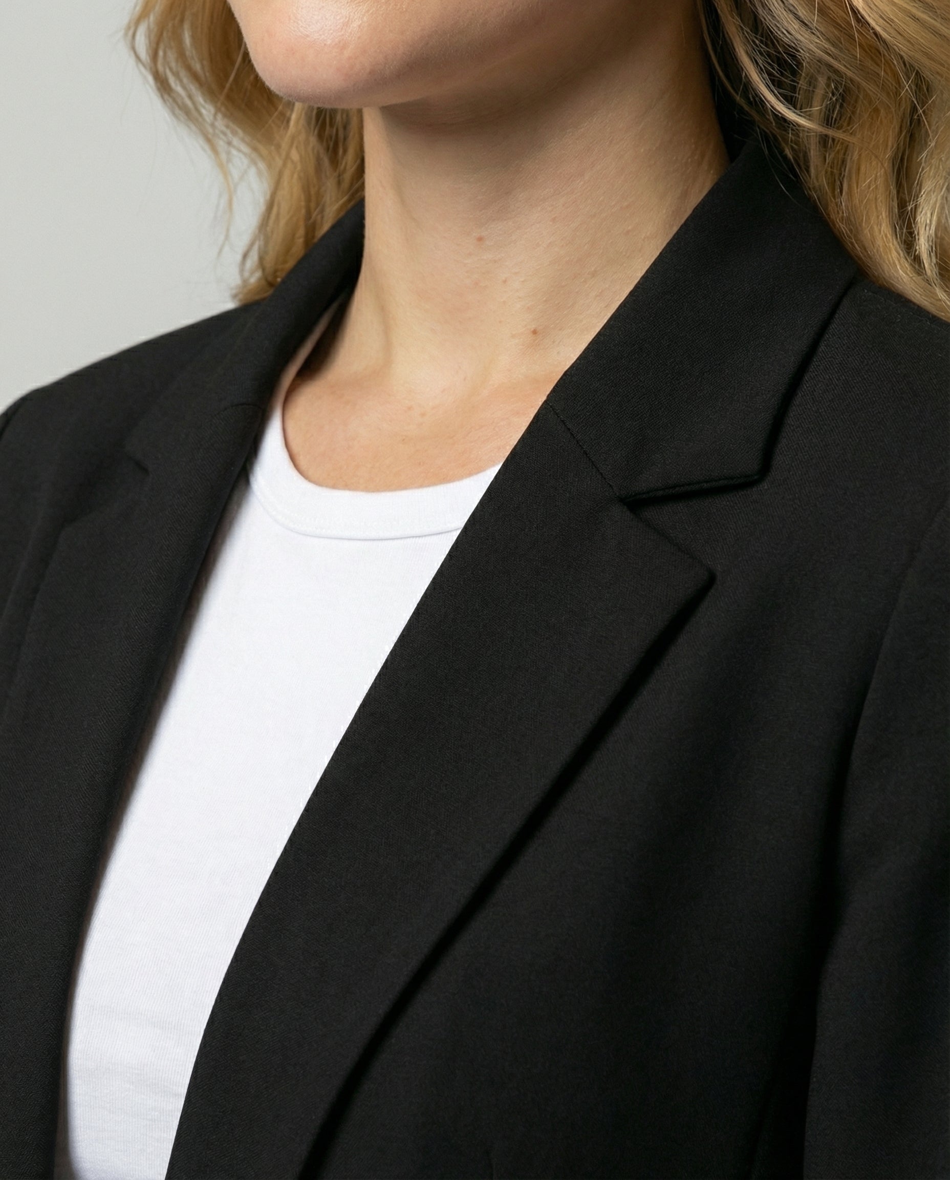 fitted elegant blazer with open-front design and tailored silhouette