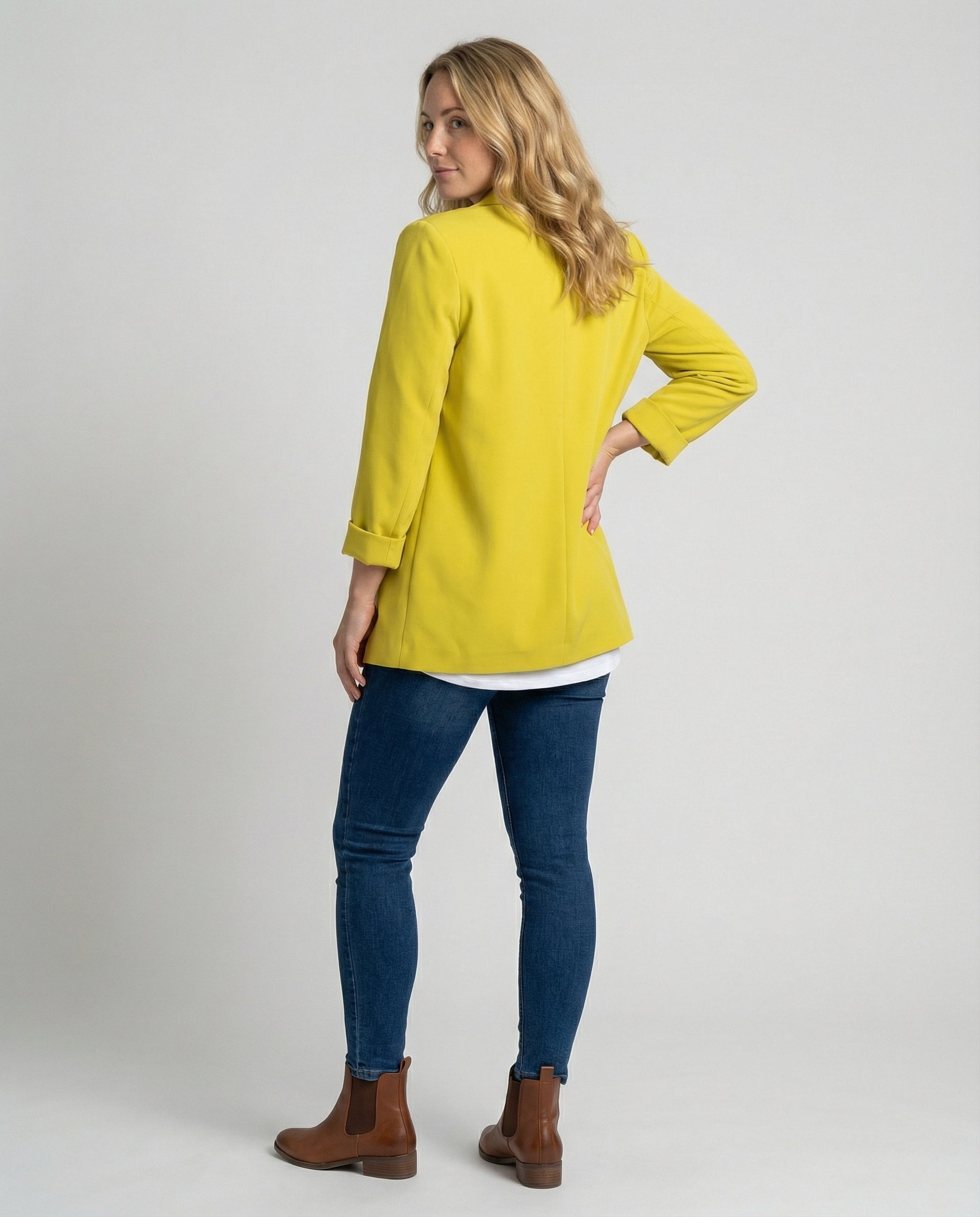 slim-fit blazer with tailored structured design and classic button front